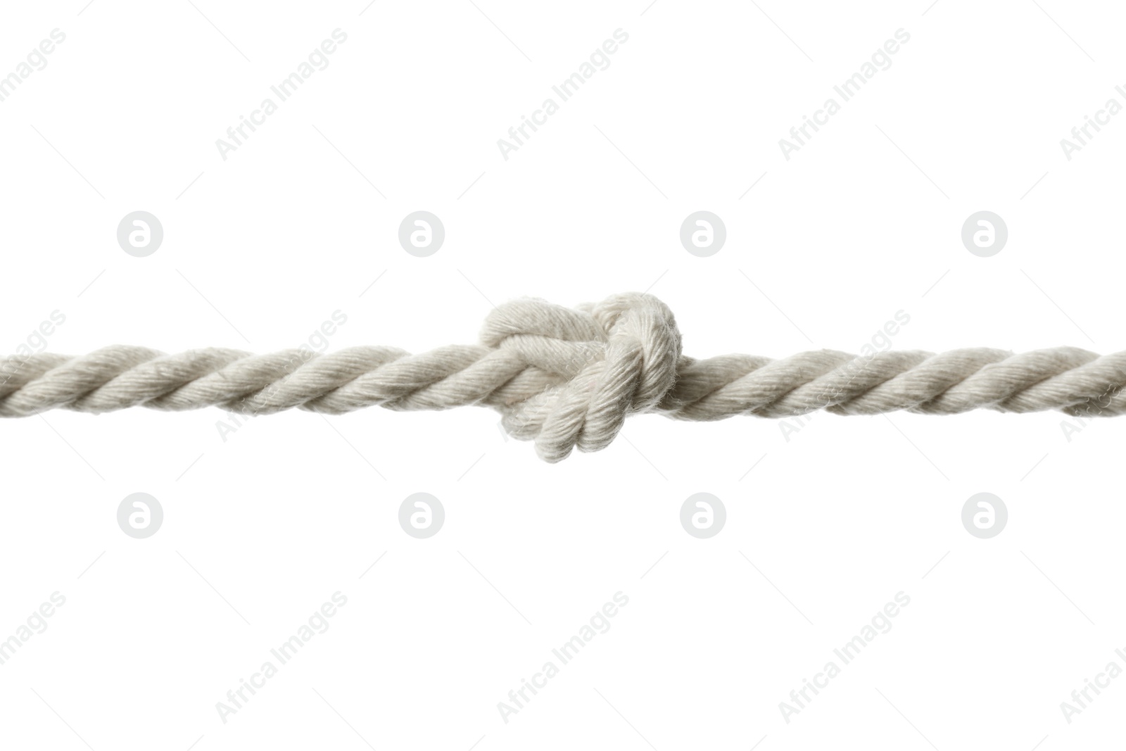 Photo of Cotton rope with knot on white background