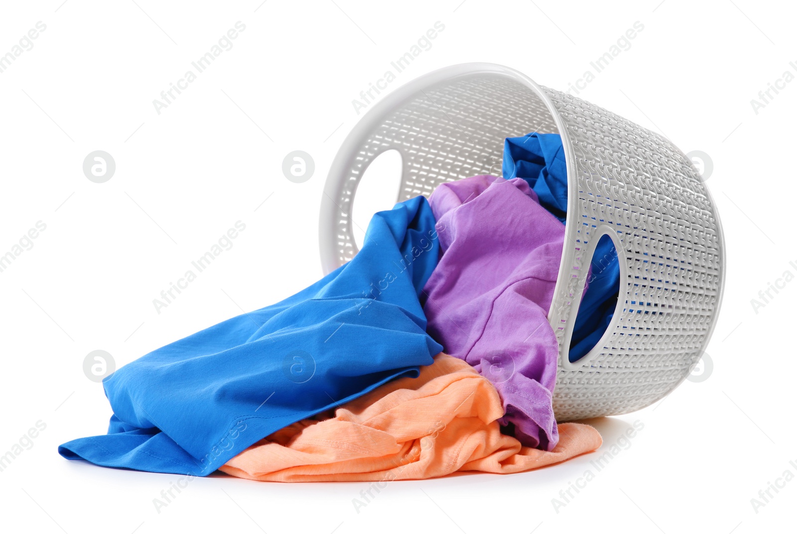 Photo of Laundry basket with scattered dirty clothes isolated on white