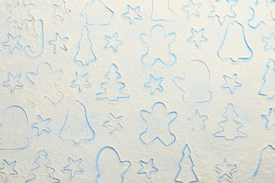 Photo of Different Christmas cookie shapes made of flour on light blue background, top view