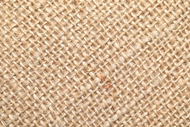 Texture of beige fabric as background, top view