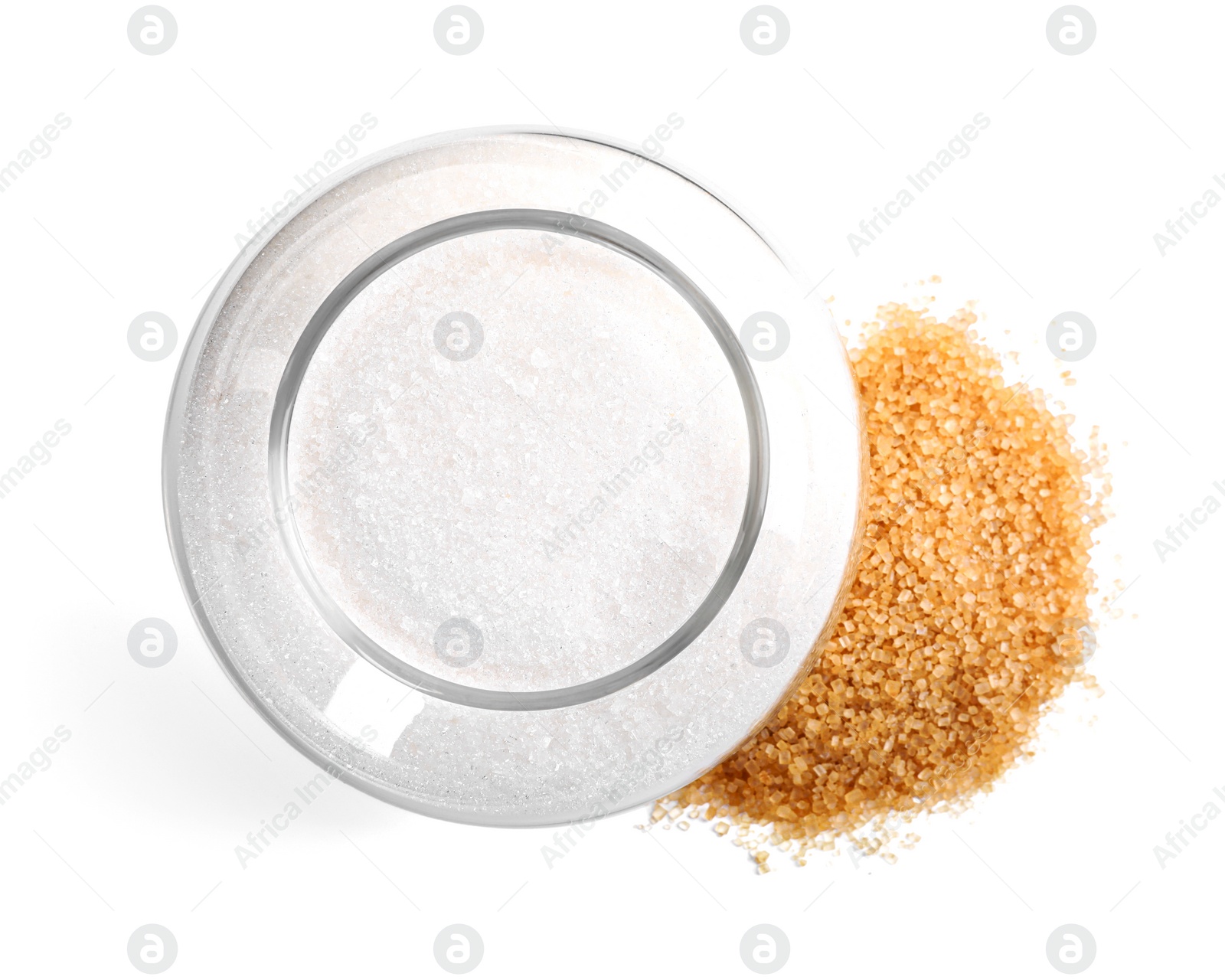 Photo of Different types of sugar and glass jar isolated on white, top view