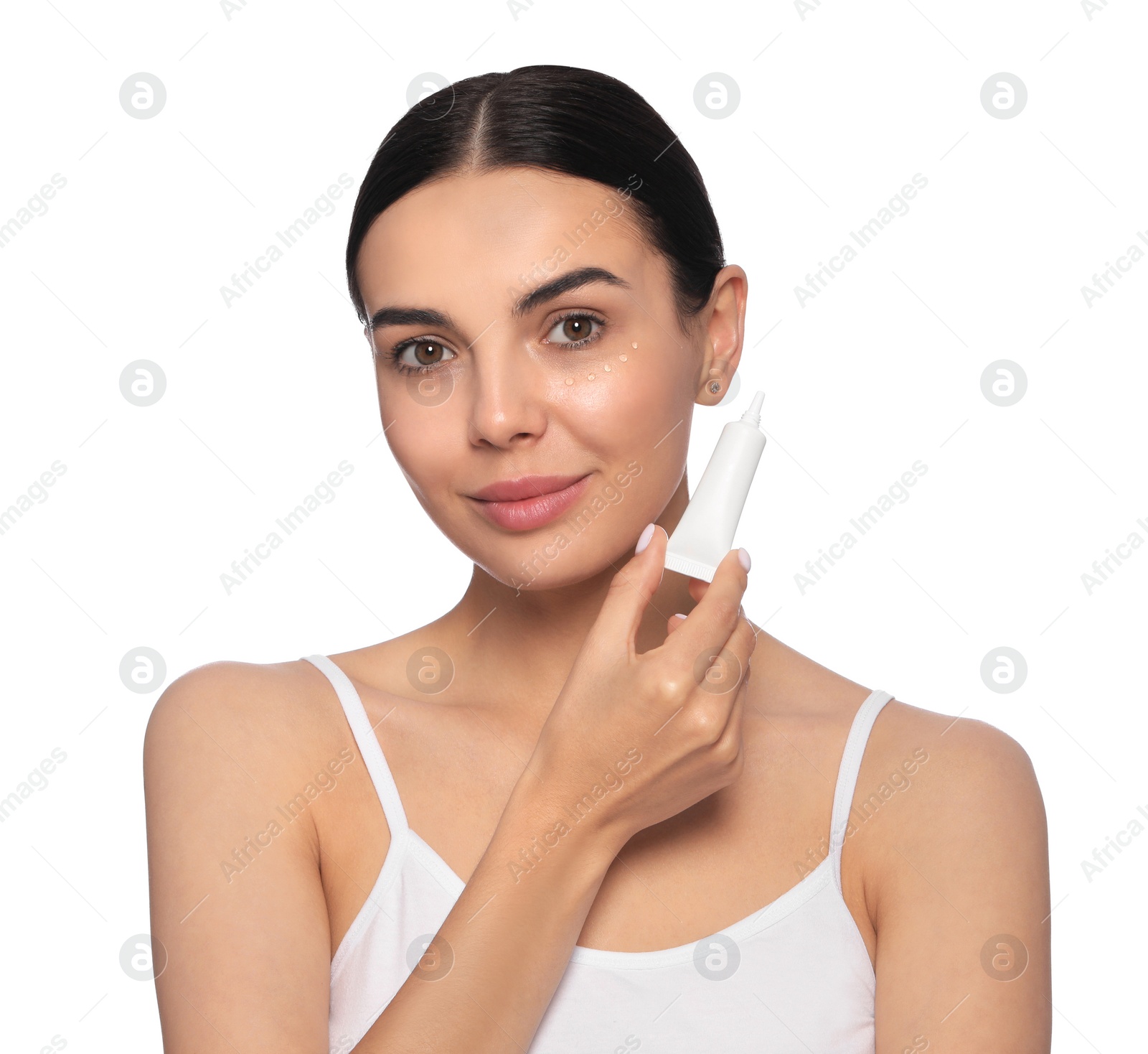 Photo of Beautiful young woman with gel on skin under eye against white background