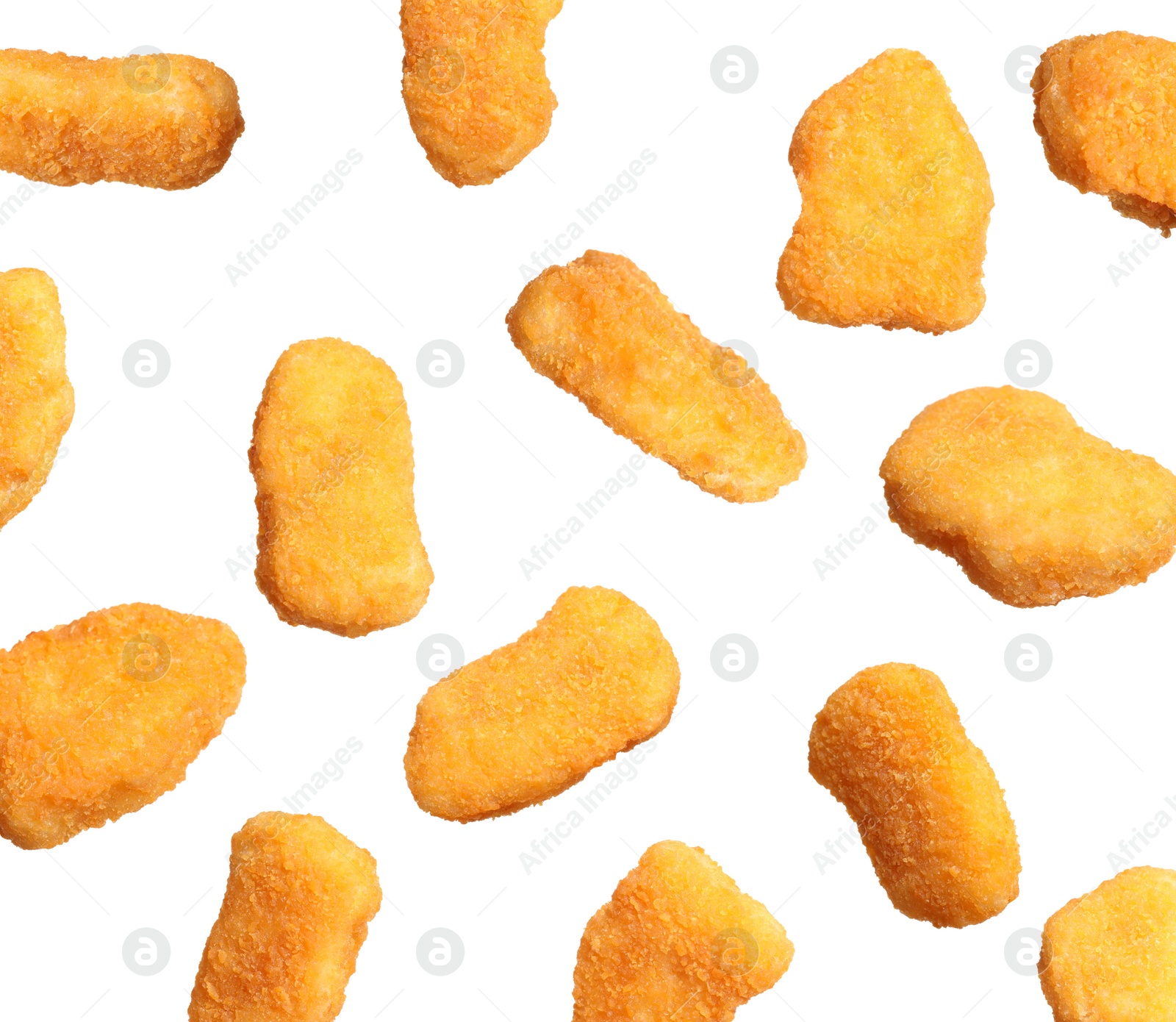 Image of Fresh chicken nuggets falling on white background