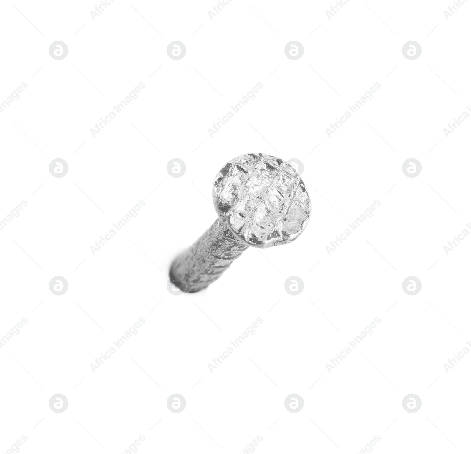 Photo of One shiny metal nail isolated on white