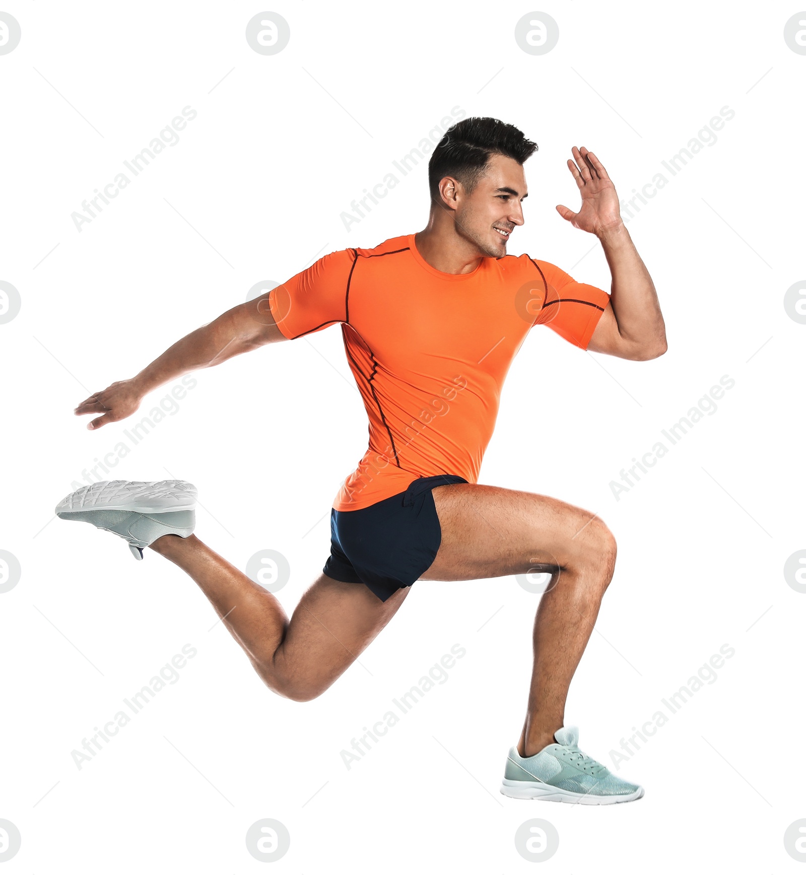 Photo of Handsome young man running on white background