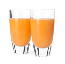 Photo of Tasty tangerine liqueur in shot glasses isolated on white