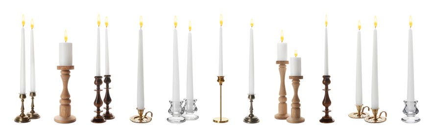 Set of different stylish candlesticks with burning candles on white background, banner design