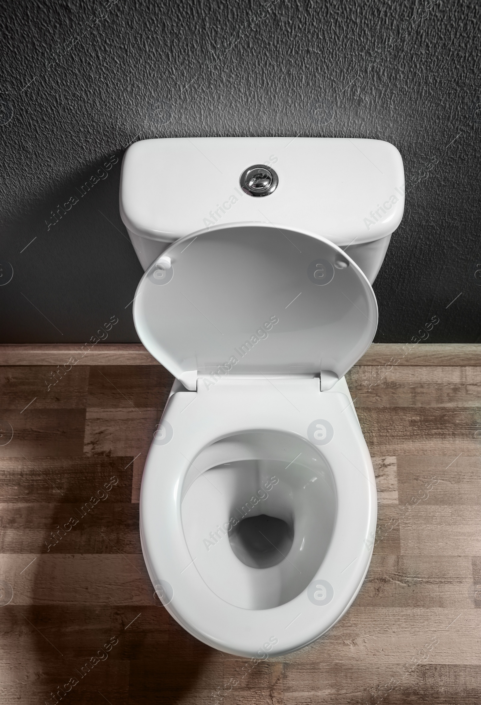 Photo of New ceramic toilet bowl indoors, top view