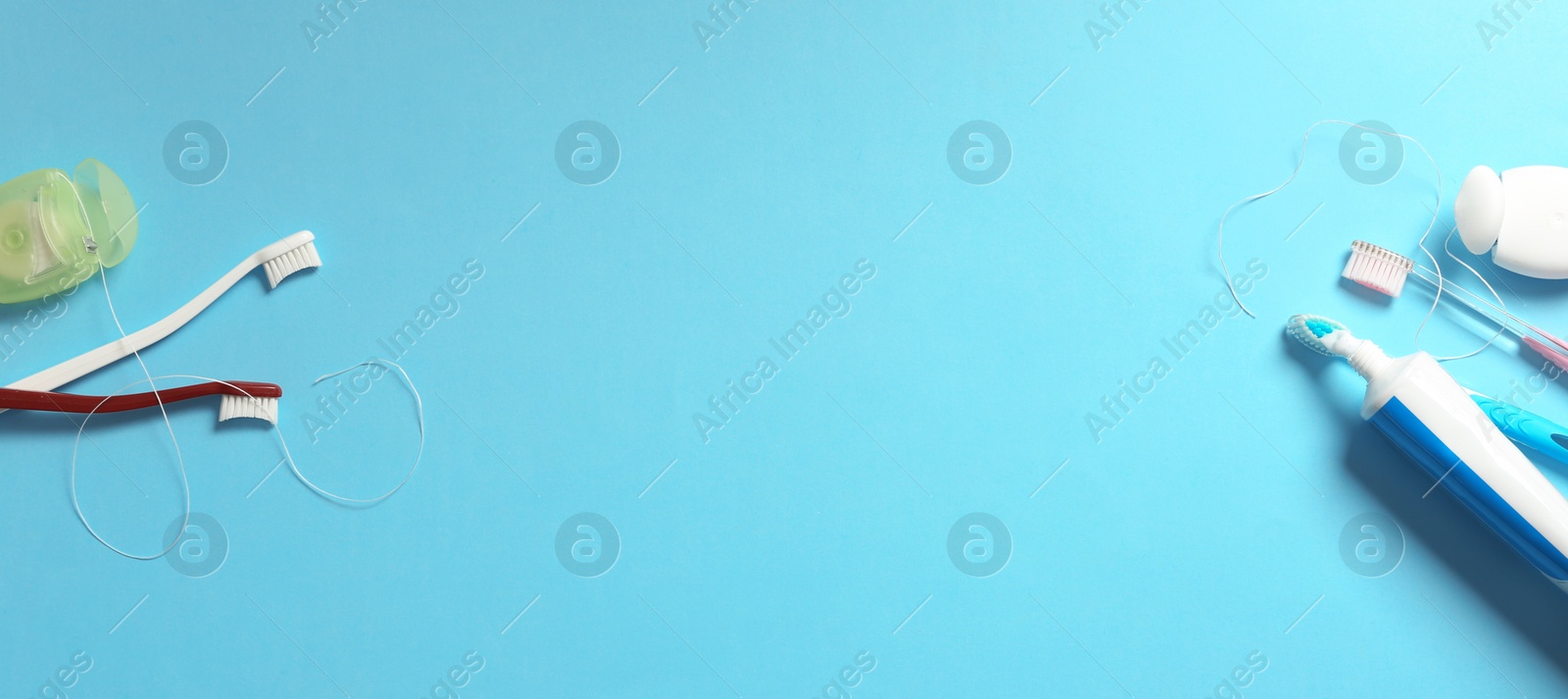 Photo of Flat lay composition with oral care items on color background. Space for text