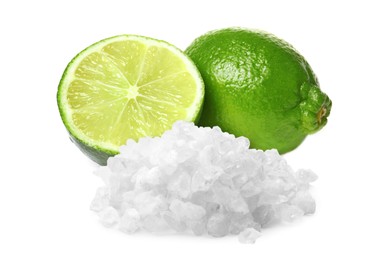 Image of Limes and salt isolated on white. Margarita cocktail ingredients