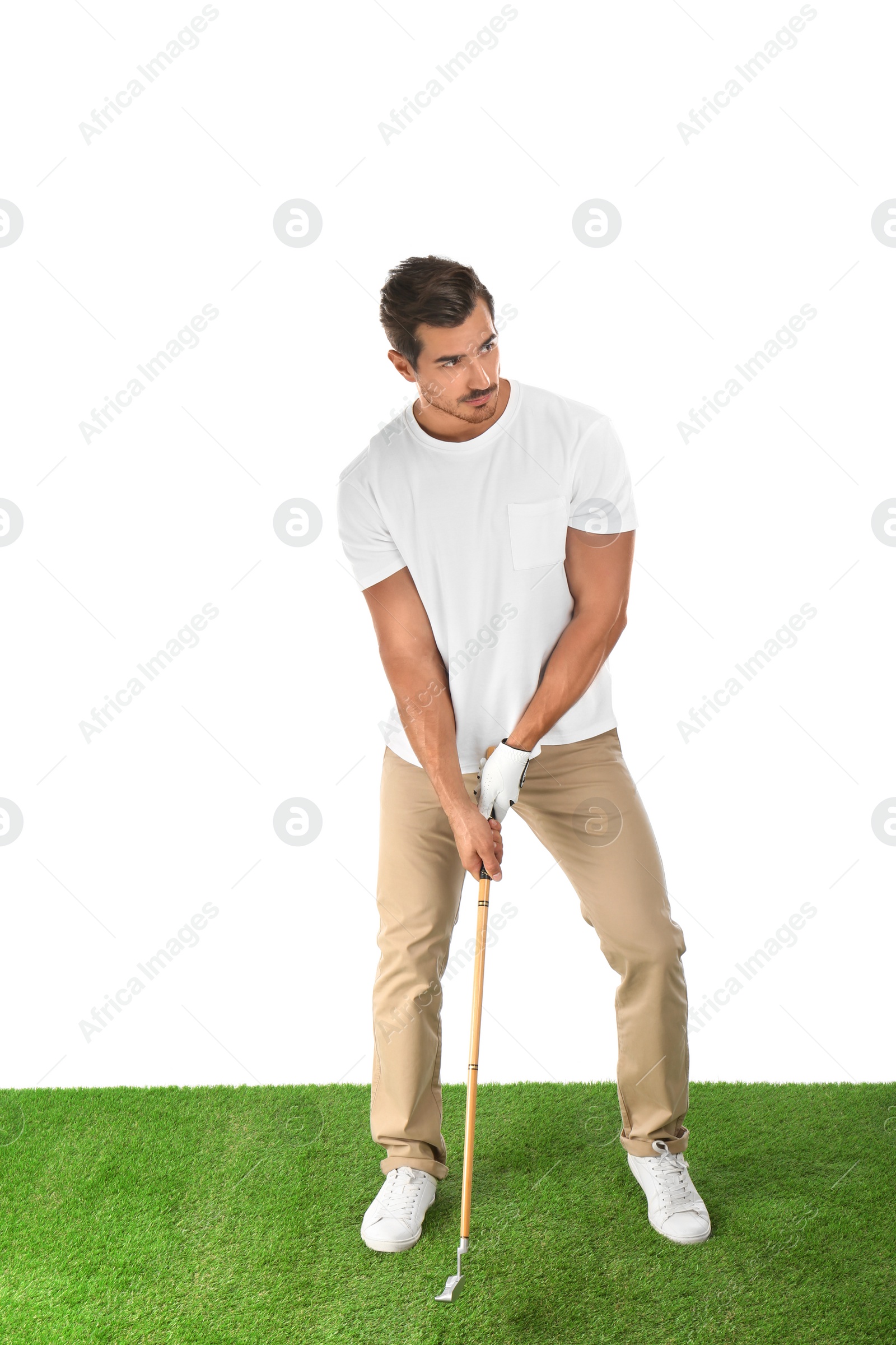 Photo of Young man playing golf on white background