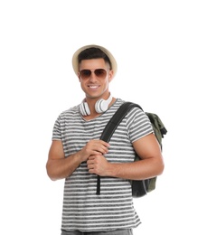 Man with hat and headphones on white background. Summer travel