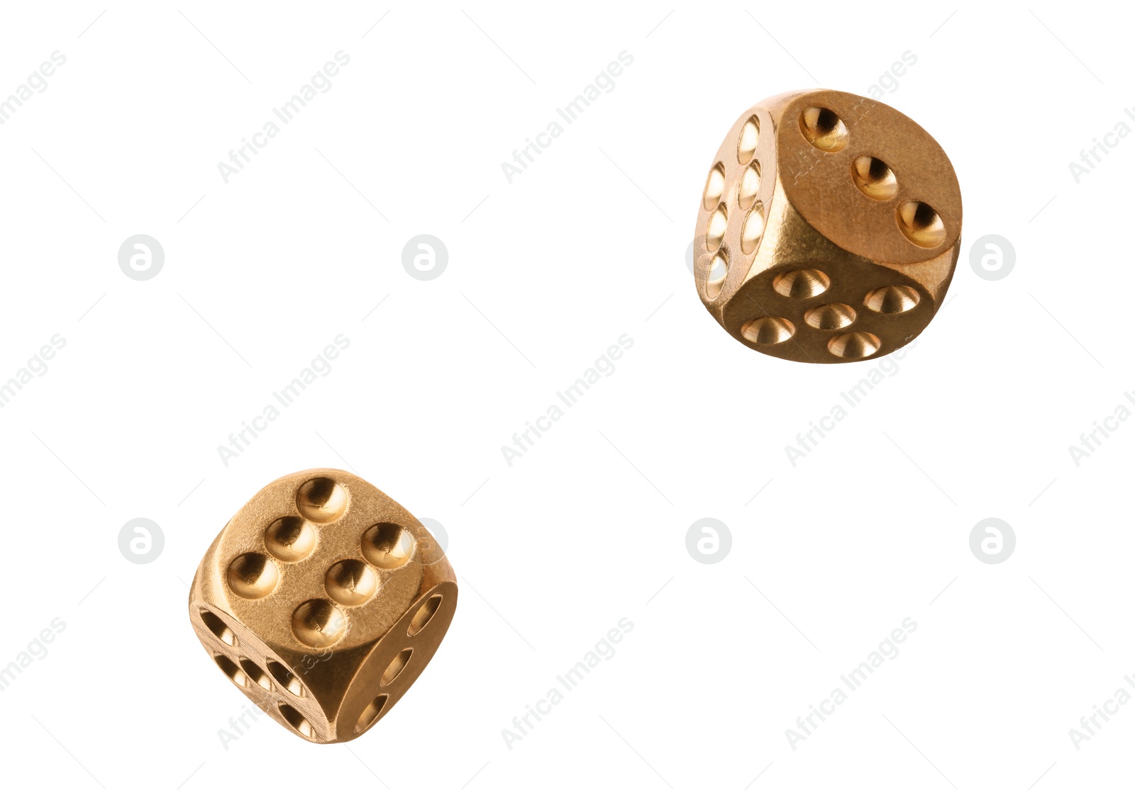 Image of Two golden dice in air on white background