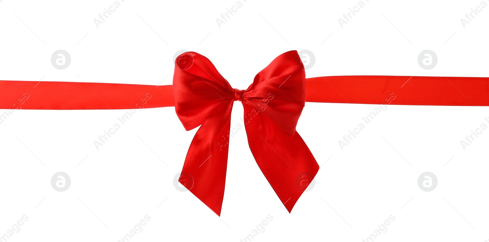 Photo of Red ribbon with bow on white background. Festive decoration