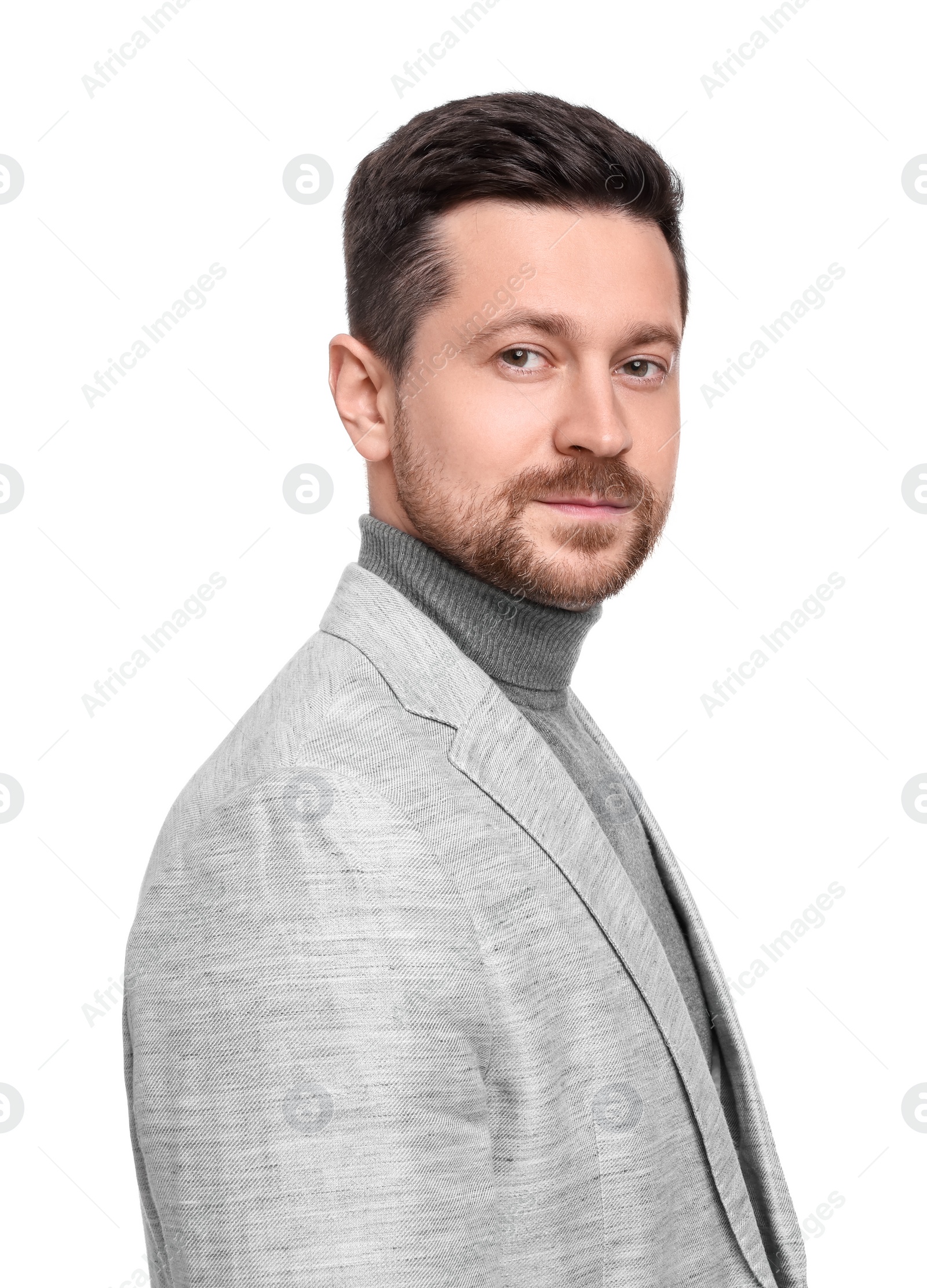 Photo of Handsome bearded businessman in suit on white background