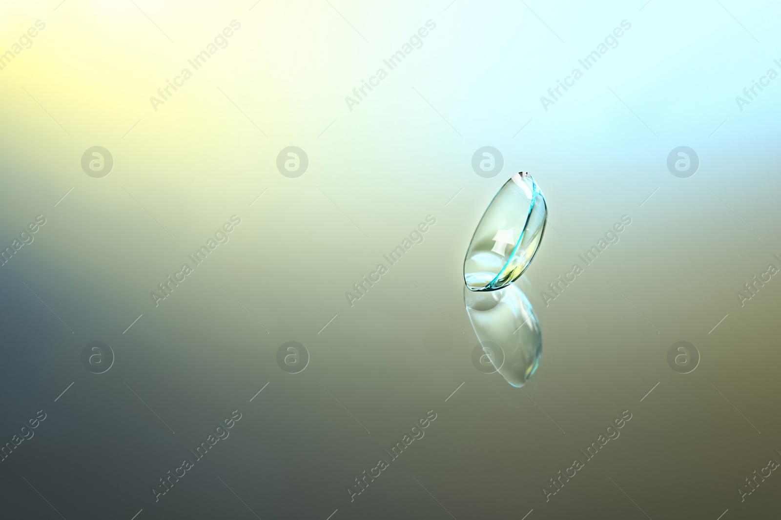 Photo of Contact lens on color background