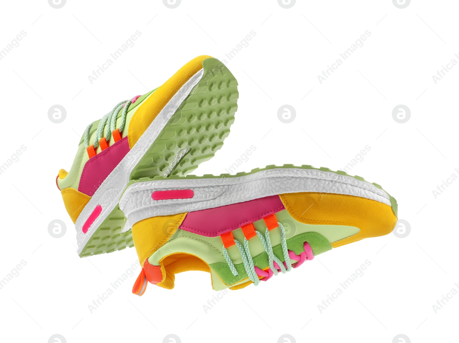 Photo of Pair of stylish colorful sneakers on white background