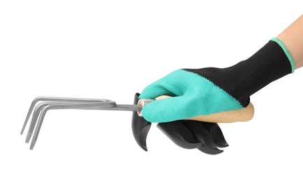 Photo of Woman in claw gardening glove holding rake on white background, closeup