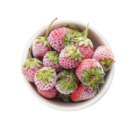 Tasty frozen strawberries in bowl on white background, top view