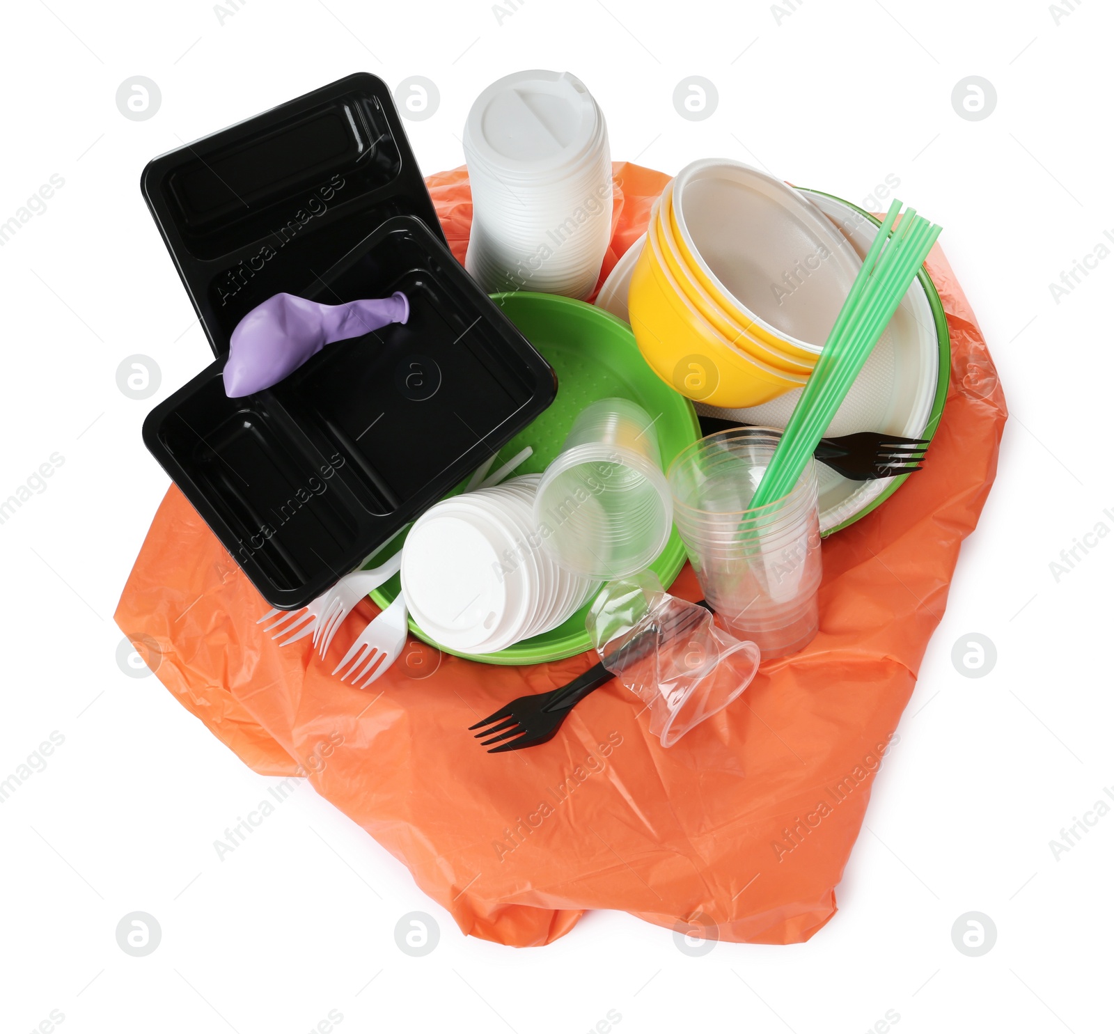 Photo of Pile of different plastic items on white background