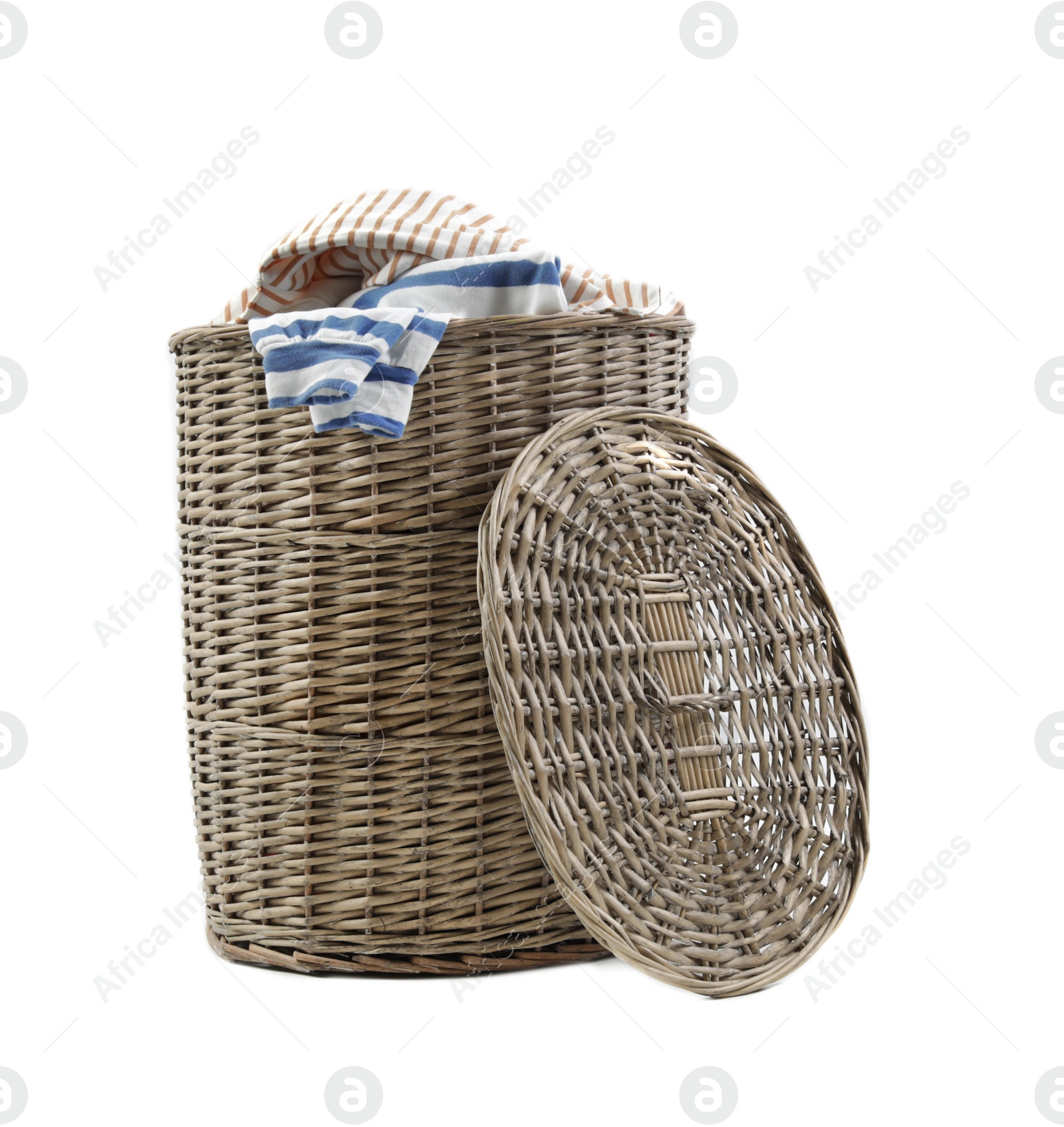 Photo of Wicker laundry basket with dirty clothes on white background