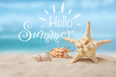 Image of Hello Summer. Beautiful starfish and seashells on sandy beach