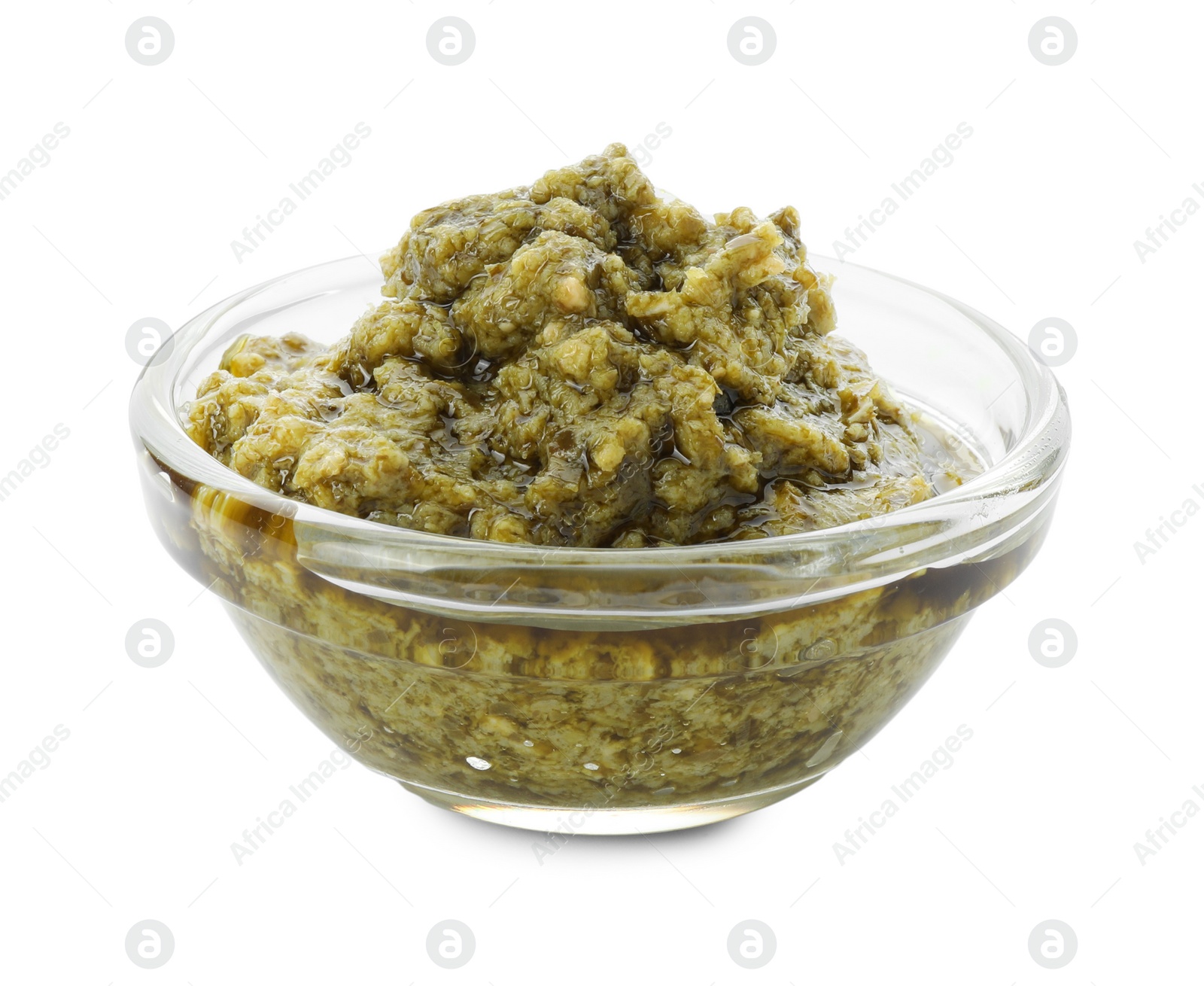 Photo of Tasty pesto sauce in bowl isolated on white