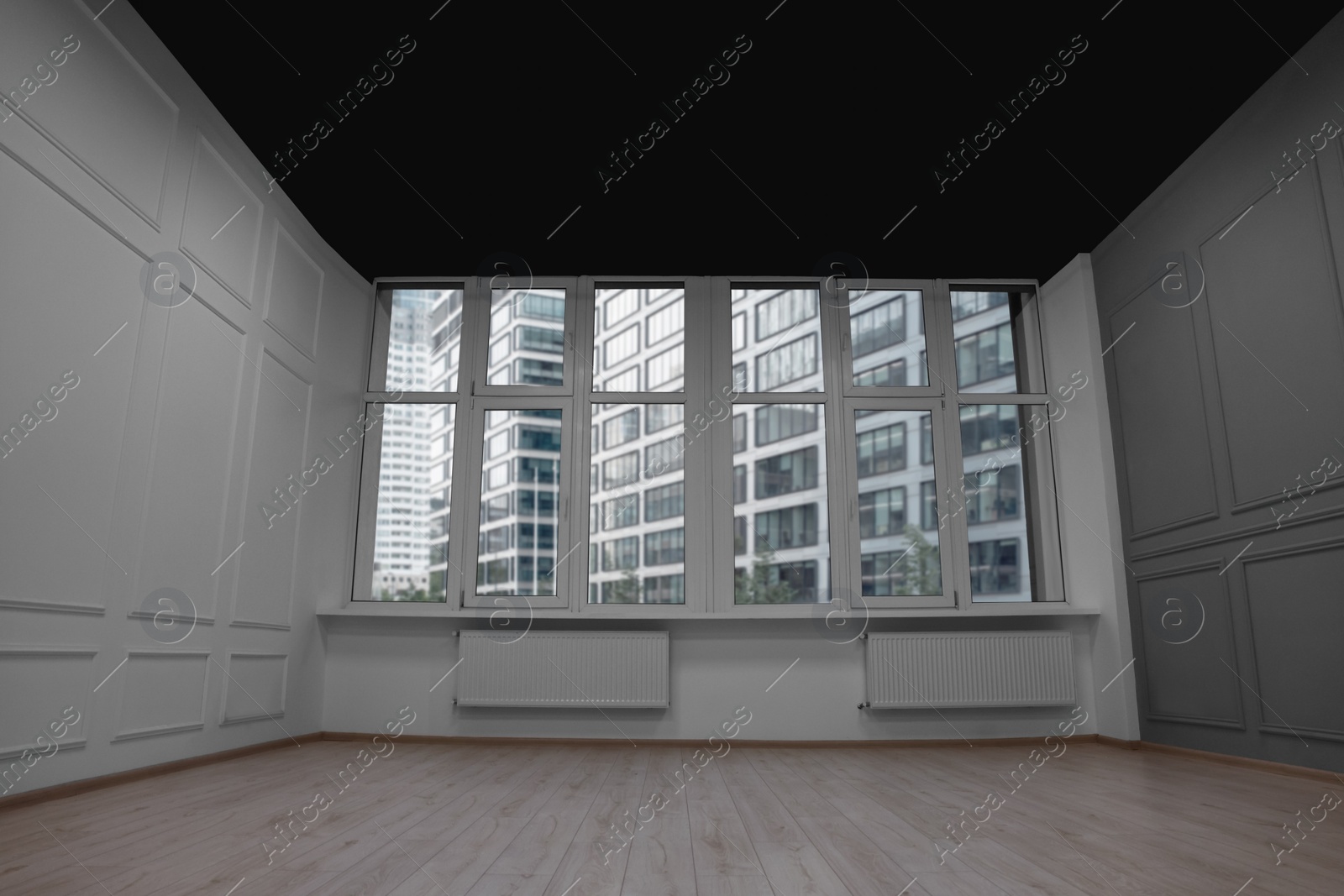 Photo of New empty room with clean windows and light walls