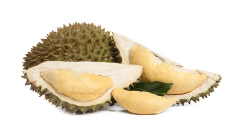 Photo of Cut and whole ripe durians on white background