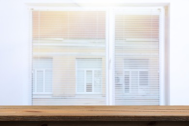 Image of Empty wooden surface in room. Mockup for design