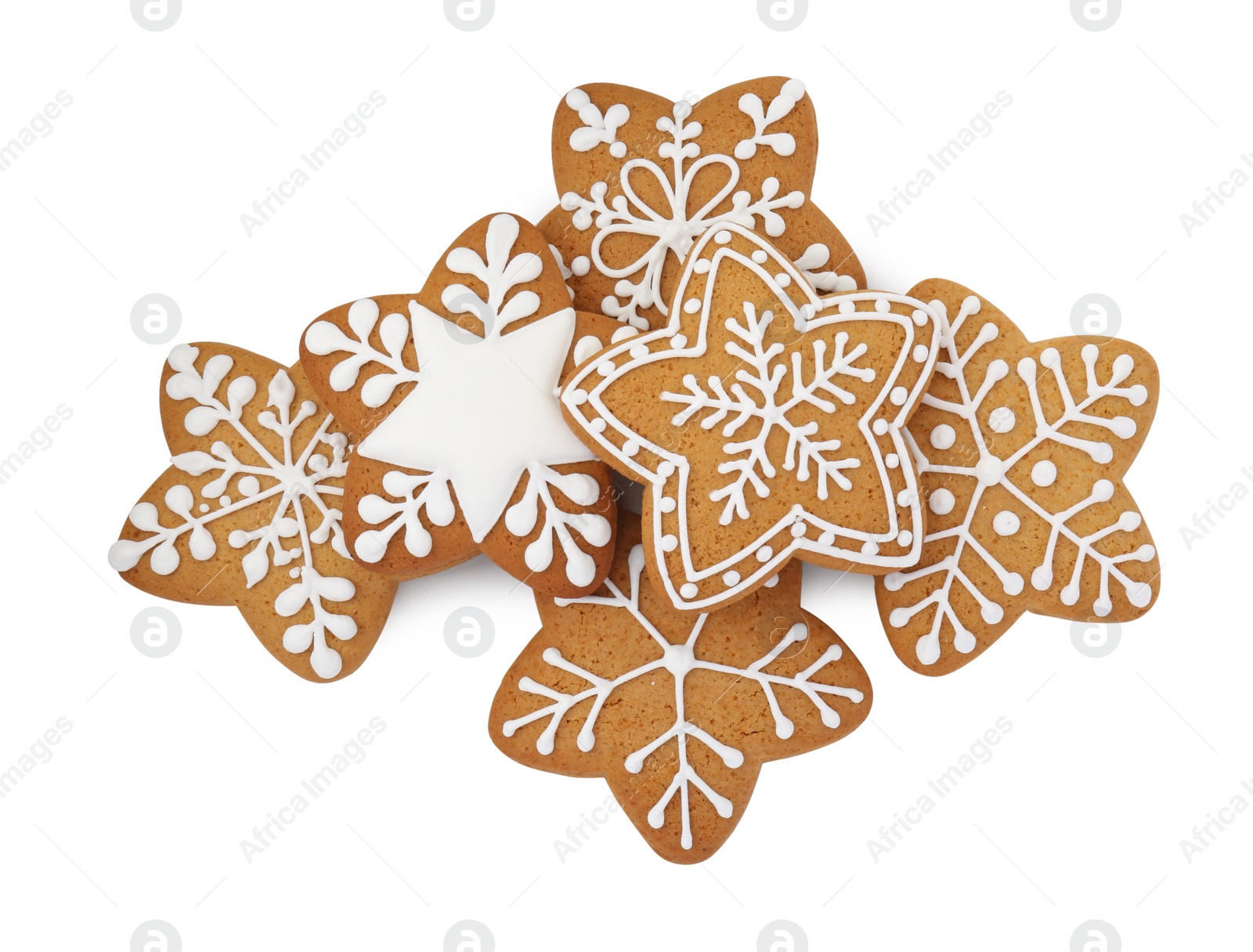 Photo of Tasty star shaped Christmas cookies with icing isolated on white, top view