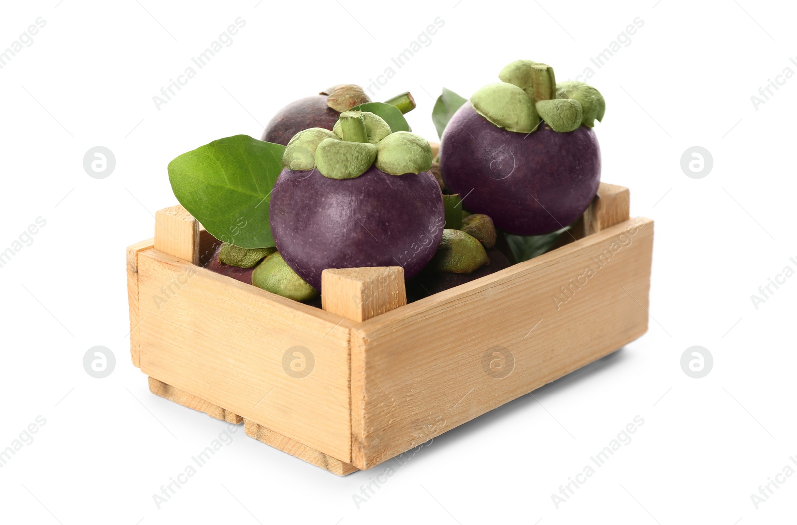 Photo of Fresh mangosteen fruits with green leaves in wooden crate on white background