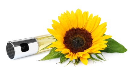 Photo of Spray bottle with cooking oil and sunflower on white background