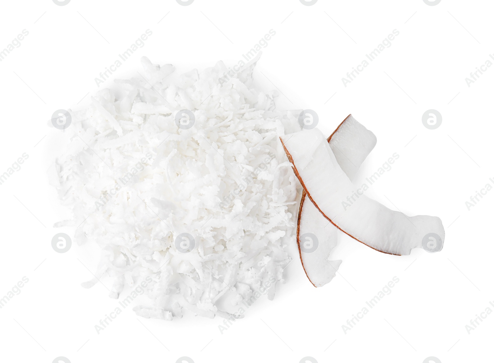Photo of Pile of coconut flakes isolated on white, top view