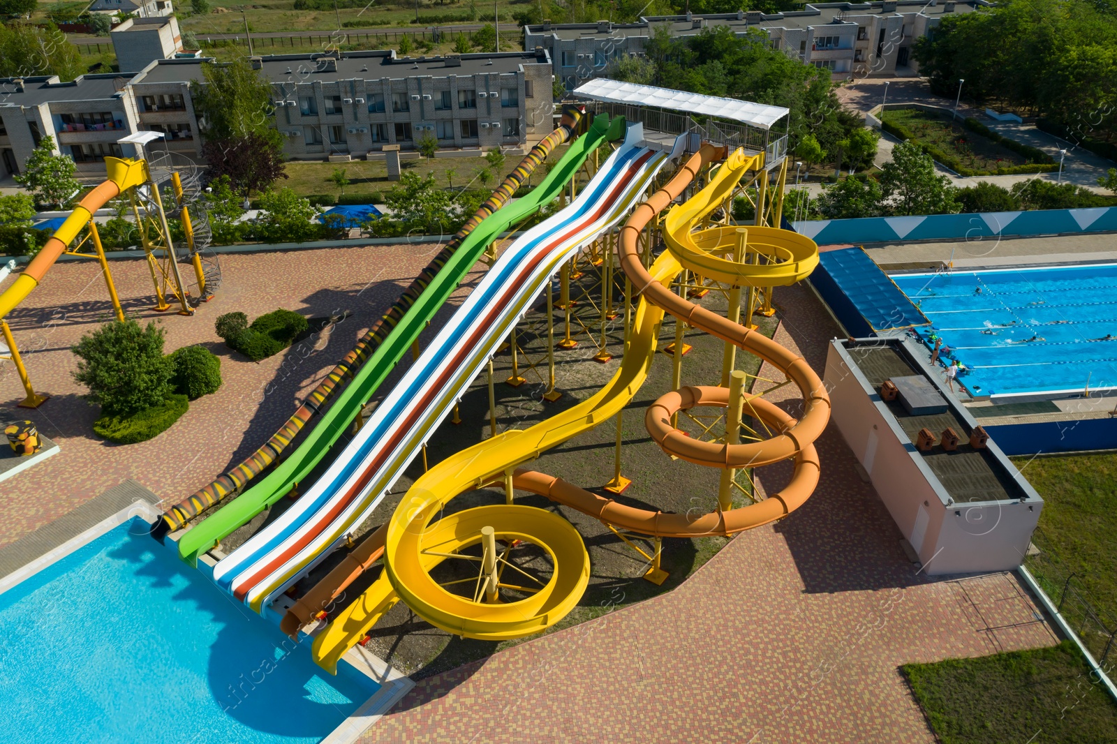 Image of Aerial view of water park on sunny day