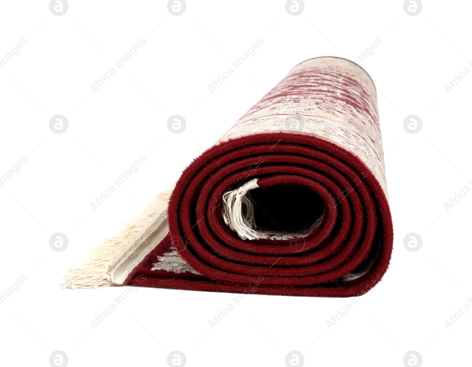 Photo of Rolled carpet on white background. Interior element