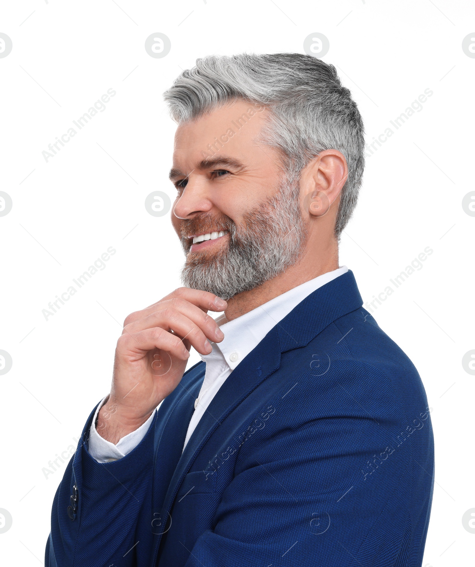 Photo of Mature businessman in stylish clothes posing on white background