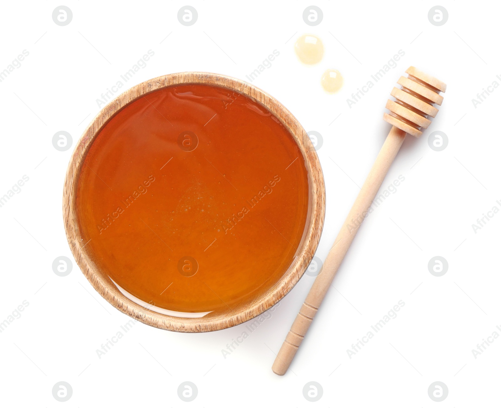 Photo of Tasty honey in bowl and dipper on white background, top view. Space for text