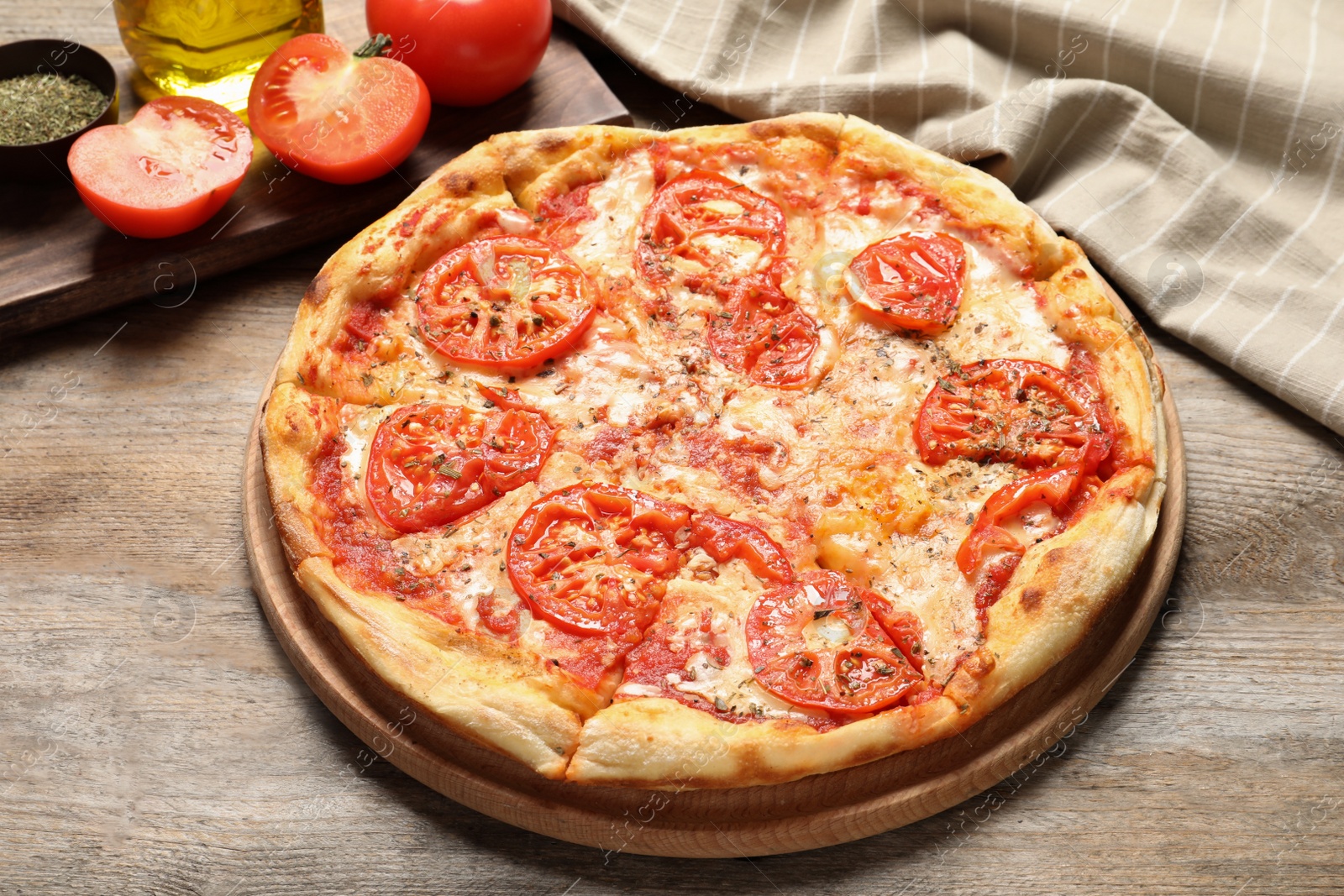 Photo of Hot cheese pizza Margherita on wooden table