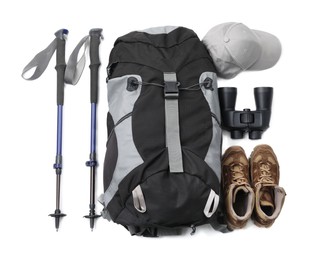 Pair of trekking poles and camping equipment for tourism on white background, top view