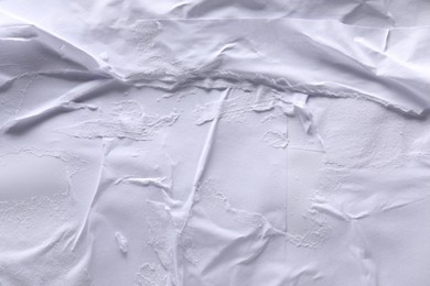 Photo of Texture of white creased paper as background, top view. Wall poster