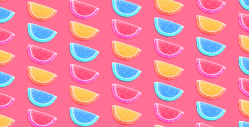 Image of Tasty jelly candies on pink background. Pattern design