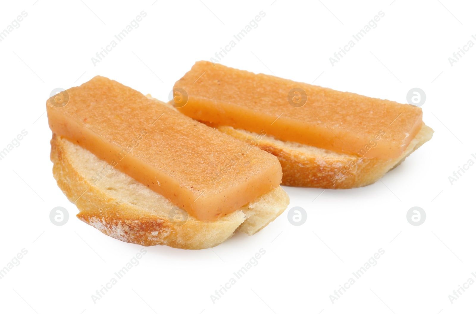 Photo of Bread with delicious sweet quince paste isolated on white