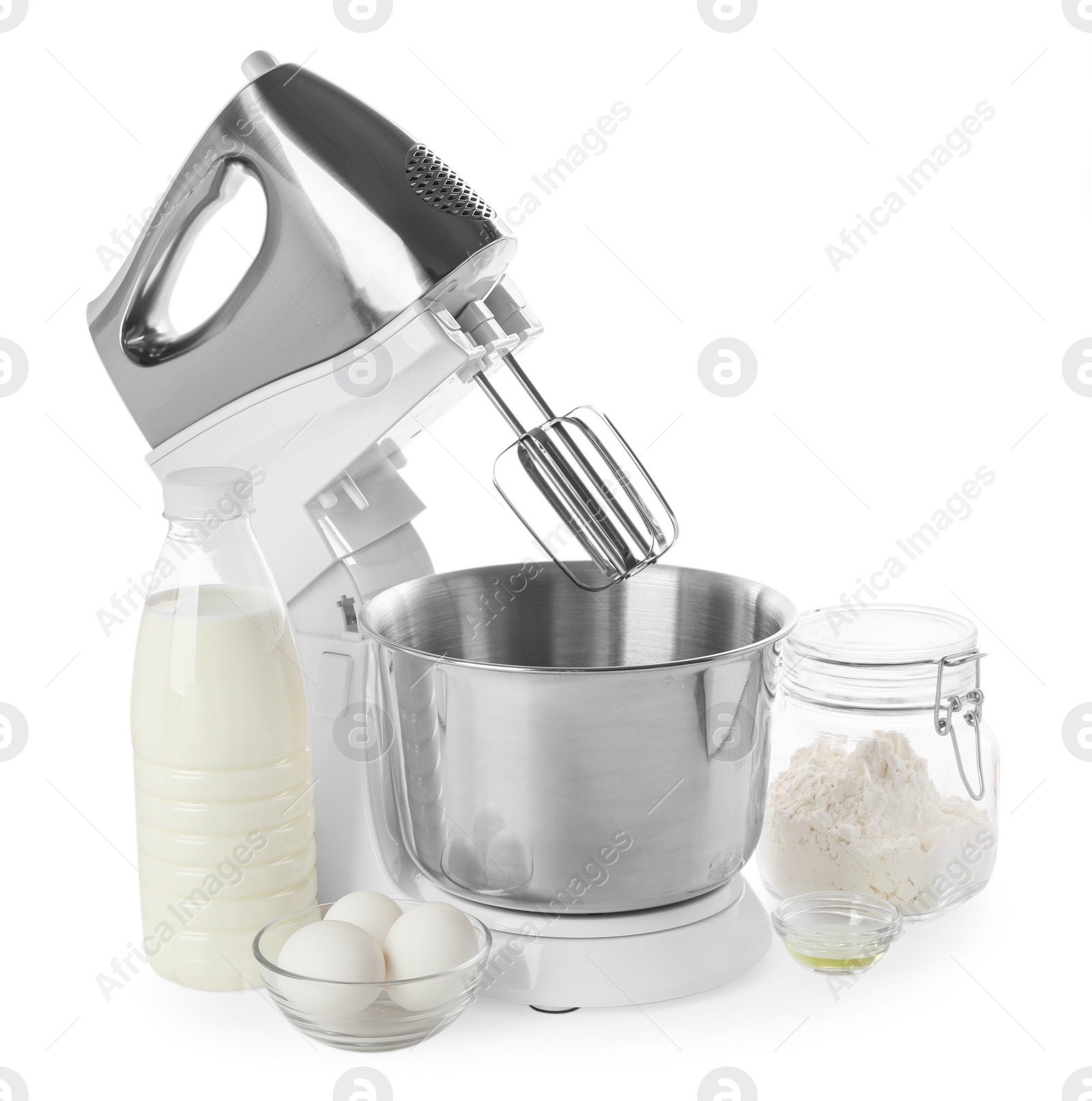 Photo of Stand mixer and different ingredients for dough isolated on white