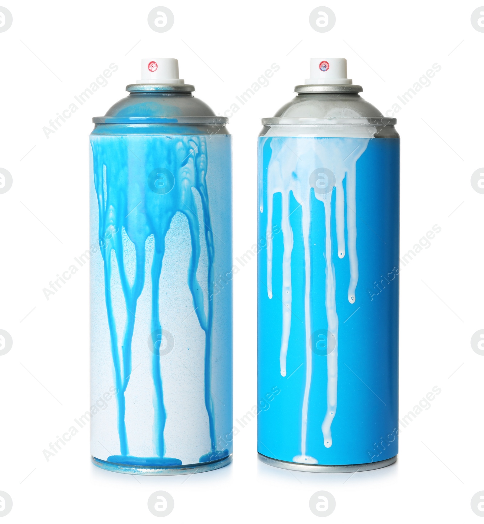 Photo of Used cans of spray paint on white background