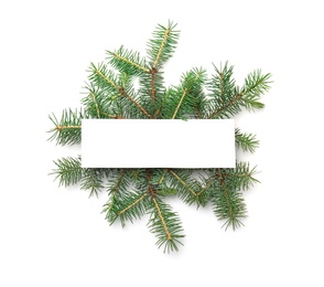 Photo of Blank card and branches of Christmas tree on white background, top view