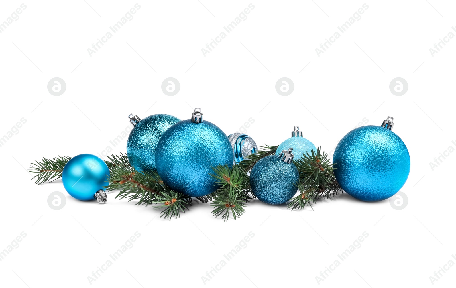 Photo of Beautiful Christmas balls and fir twigs isolated on white