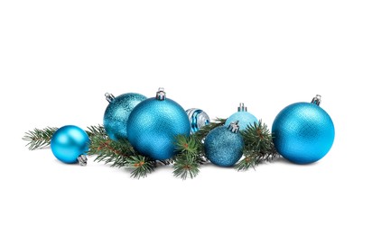 Beautiful Christmas balls and fir twigs isolated on white