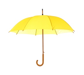 Photo of Modern opened yellow umbrella isolated on white