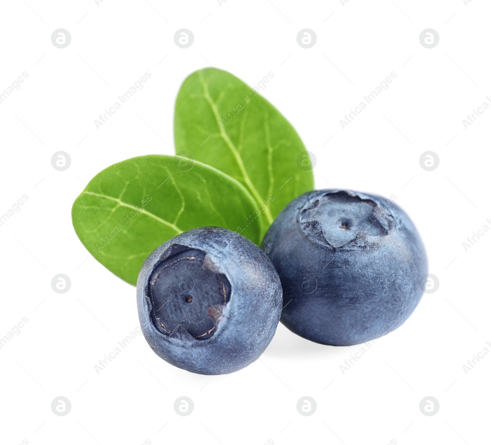 Photo of Fresh raw tasty blueberries with leaves isolated on white